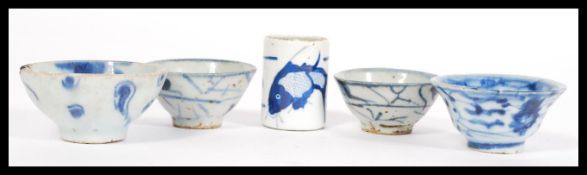 A group of 18th Century Chinese porcelain to include four tea bowls having hand painted blue and