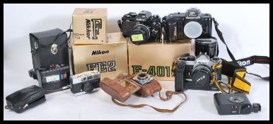 A great collection of vintage cameras, lenses and accessories - some complete in original boxes to