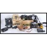 A great collection of vintage cameras, lenses and accessories - some complete in original boxes to