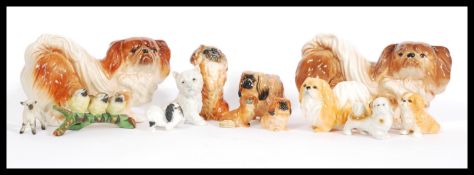 A collection of ceramic animals to include Beswick, Royal Doulton, Worcester, Melba ware, etc.