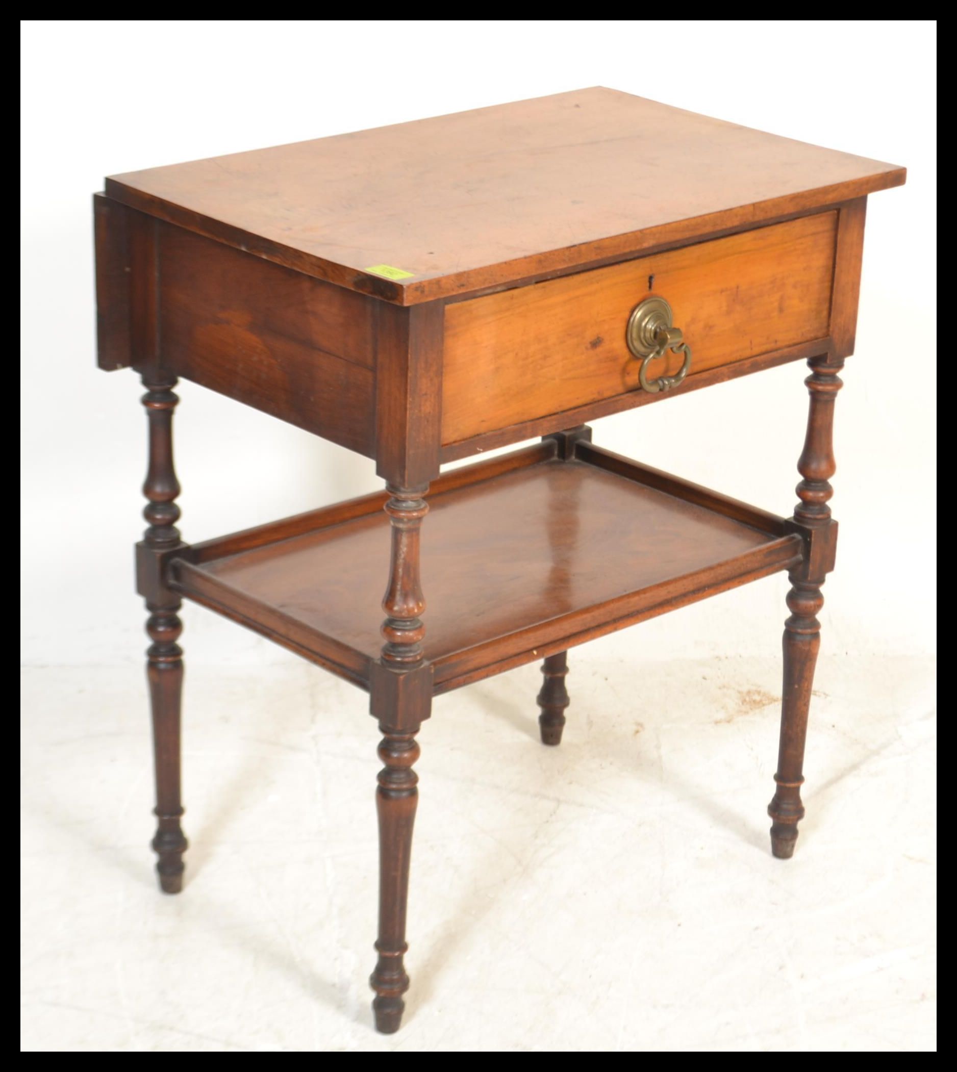 A Victorian mahogany side / lamp table being raised on turned legs with lower tier under single - Image 2 of 6