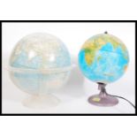 Two vintage globes to include a 1960's National Geographic globe set to clear plastic stand and