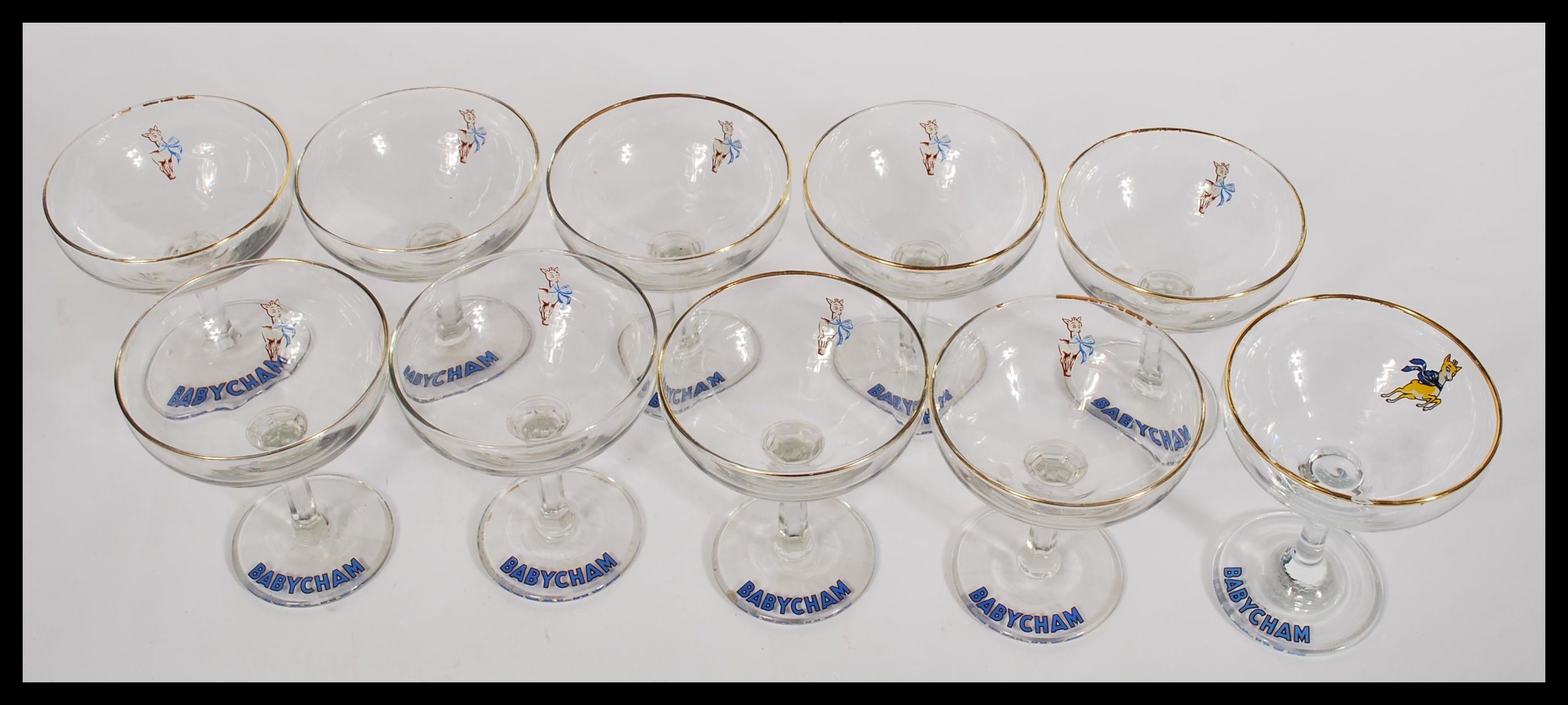 A set of ten vintage retro 20th Century Babycham glasses raised on circular bases with gilt rim - Image 2 of 5