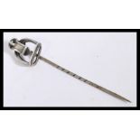 A silver white metal hat pin / tie pin of hunting interest, having a stirrup and buckle finial and a