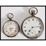 A silver hallmarked gentleman's pocket watch having a round face with roman numerals to the