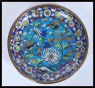 A 19th Century Japanese Meiji period Cloisonne plate on copper having decoration of birds and