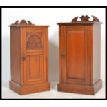 An Edwardian satin walnut pot cupboard with carved door raised on plinth base with stage gallery top