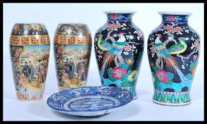 Two pairs of 20th Century Japanese vases, the pair of satsuma vases decorated with scholars and