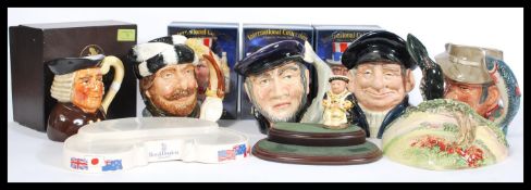 A group of four Royal Doulton character jugs to in