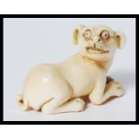 RARE MEIJI PERIOD IVORY CARVED NETSUKE OF A CROUCH