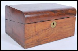 A 19th century Victorian walnut dome top tunbridge inlaid writing slope box with hinged top and
