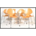 A set of six vintage Bistro chairs of beech veneer plywood construction raised on chrome legs. In