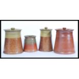 A selection of early 20th Century stoneware pottery storage jars / pots of cylindrical form with