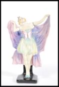 A 1930's very rare Doulton figurine ' Butterfly ' ceramic model of a girl in butterfly costume.