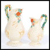 2 Clarice Cliff ' Celtic Harvest ware ' jugs /jug having printed Clarice Cliff Newport Pottery Co
