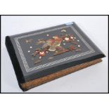 An early 20th Century Japanese lacquered wood photograph / postcard album, the silk pages painted