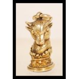 A 9ct gold fob pendant charm in the form of a bull within a crown having a blank seal to base.