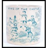 A 19th Century Victorian children's mug having a green transfer printed design featuring children