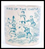 A 19th Century Victorian children's mug having a green transfer printed design featuring children