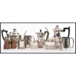 A collection of early 20th century silver plated items to include coffee / tea service comprising