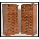 A pair of 20th century / contemporary hardwood Industrial 25 drawer pedestal chests. Each chest of