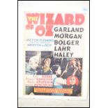 A retro 20th century reproduction advertising point of sale film movie poster for the Wizard Of