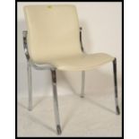 An Italian contemporary white leather side / dining / hall chair with having shaped chromed steel