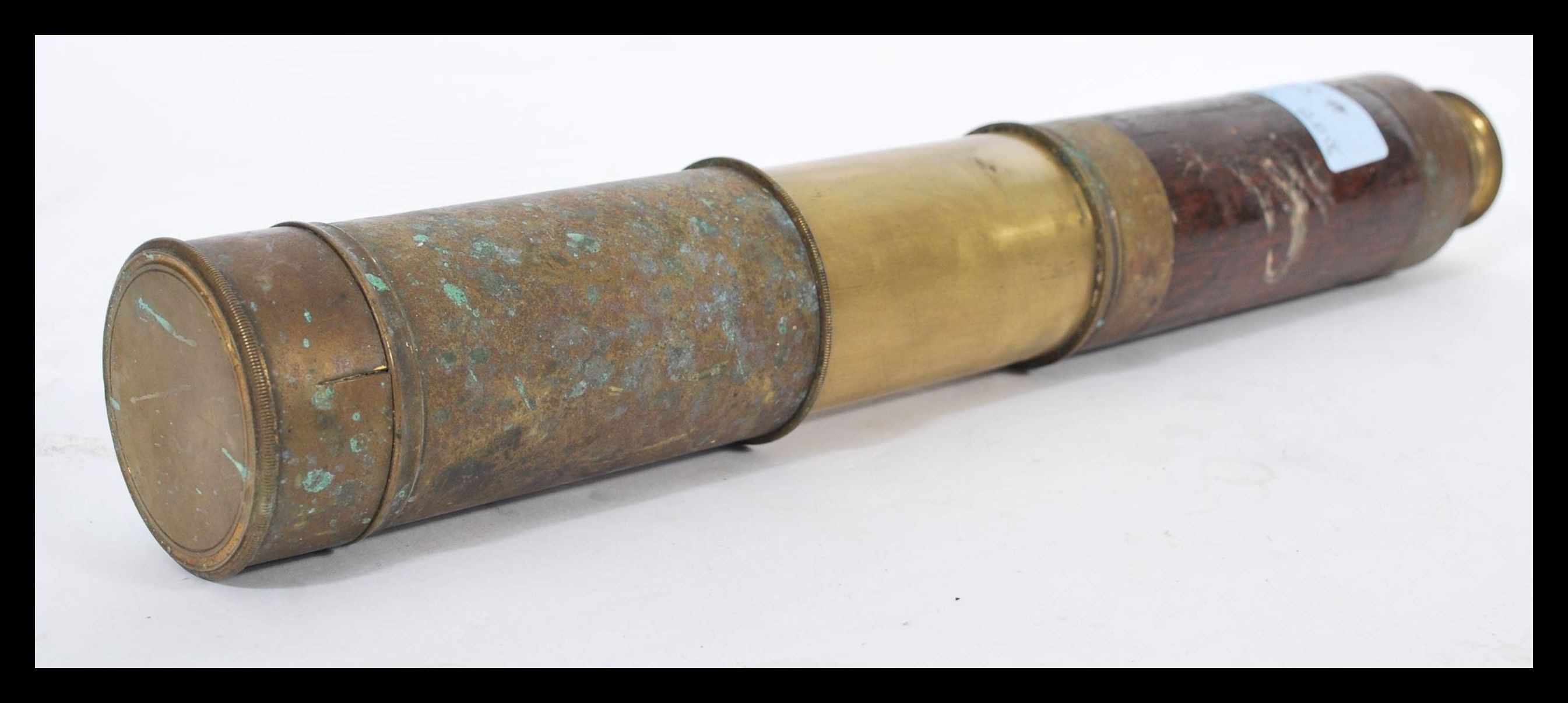 A 19th Century brass extendable telescope with a rosewood central section. - Image 4 of 6