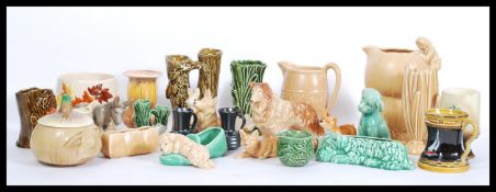 A selection of SylvaC ceramic ornaments to include a Donkey figurine with cream baskets, a green dog