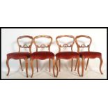 A set of 4 good 19th century Victorian mahogany balloon back dining chairs having red velour