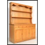 A good quality ash / oak Welsh dresser having been commission made to the vendors requirements.