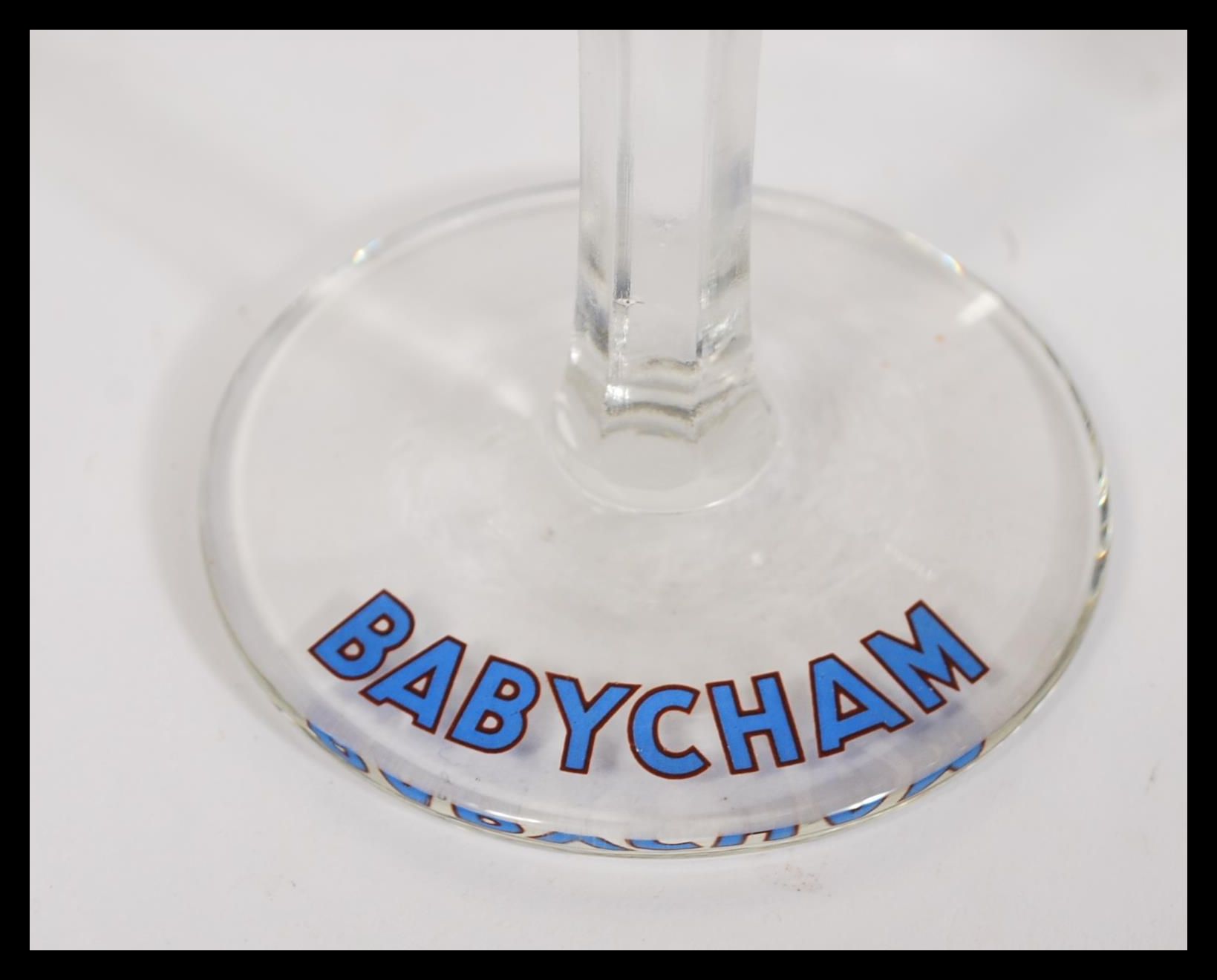 A set of ten vintage retro 20th Century Babycham glasses raised on circular bases with gilt rim - Image 3 of 5