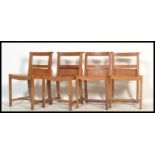 A set of 4 mid 20th century Air Ministry / War Department style beech wood chapel chairs. Squared