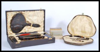 A collection of vintage 20th Century gentleman's travel vanity items, to include leather cased sets,