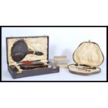 A collection of vintage 20th Century gentleman's travel vanity items, to include leather cased sets,