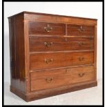 A Regency 19th century Scottish mahogany inlaid chest of drawers being raised on a plinth base