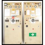 A pair of vintage Ministry Of Defence metal instrument doors, the doors fitted with several gauges