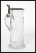 A 19th century Georgian faceted glass stein tankard having a tall faceted body with pewter mounts