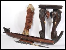 A 20th Century African tribal carved hardwood  puzzle table together with a carved hardwood