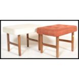 A pair of retro 20th Century teak wood stools / ottomans, raised on H - frame supports having button
