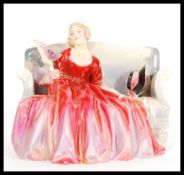 A Royal Doulton early figurine entitled Sweet & Twenty HN1298. Stamped to base. Measures 14cm high