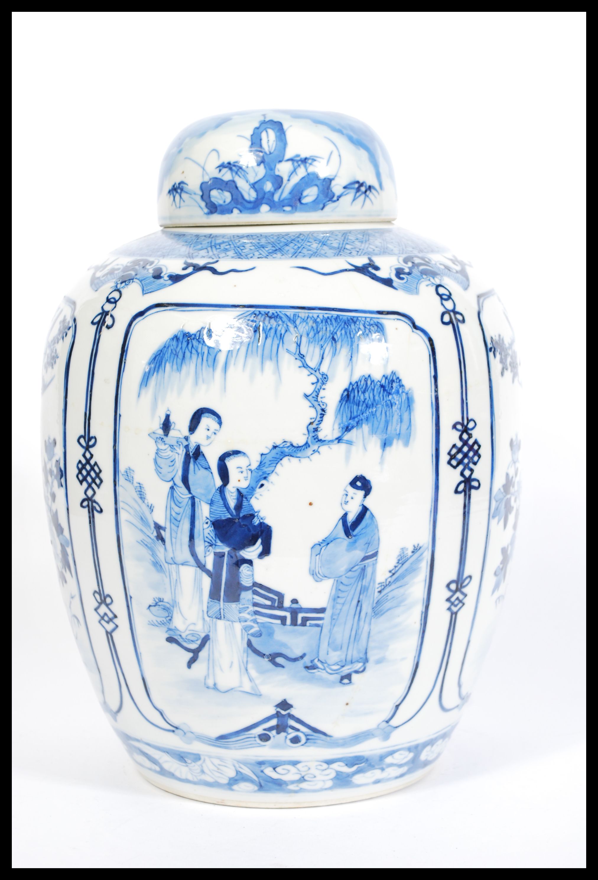 A large 19th century blue and white Chinese ginger jar with hand painted cartouche panels