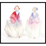 Two variation of the Royal Doulton Figurine Sweet Anne with hand painted and printed marks to