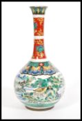 A 19th century Chinese baluster bottle vase. The g