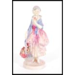 A Royal Doulton figurine entitled Phyllis HN1486 having printed and painted marks to base.