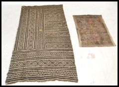 A 20th Century possibly Polynesian Tapa cloth, hand woven and comprising of several panels