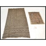 A 20th Century possibly Polynesian Tapa cloth, hand woven and comprising of several panels