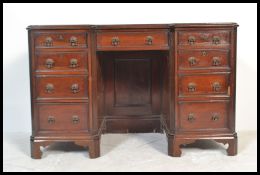 A 19th century heavy solid mahogany inverted twin pedestal desk. Raised on ogee  bracket feet with