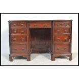 A 19th century heavy solid mahogany inverted twin pedestal desk. Raised on ogee  bracket feet with