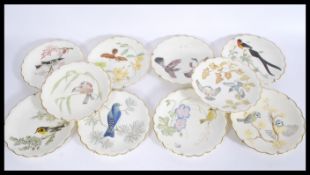 Set of ten Royal Worcester collectors plates, ' The Birds of Dorothy Doughty '. Each with gilt